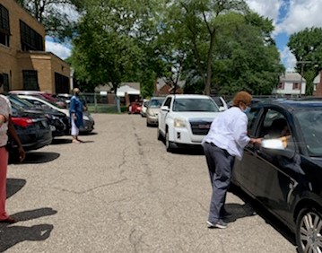 Line of cars for drive by celebration